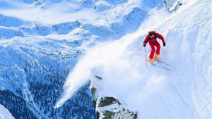 Skiing Mountain Edge Wallpaper