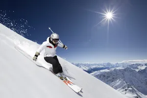 Skiing With Sun Wallpaper