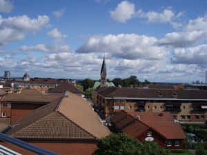 Skovde Cityscapewith Church Spire Wallpaper
