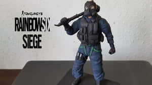 Sledge, The Mighty Attacker From Rainbow Six Siege In Action Wallpaper