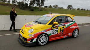 Sleek Abarth 695 In Bold Red Wallpaper