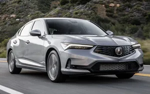 Sleek Acura Integra In A Stunning Outdoor Setting Wallpaper