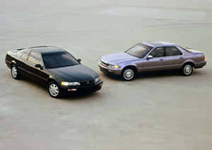 Sleek Acura Legend On The Road Wallpaper