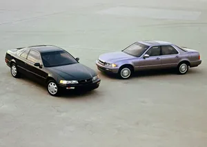 Sleek Acura Legend On The Road Wallpaper