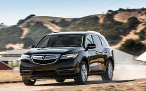 Sleek Acura Mdx In A Luxurious Setting Wallpaper