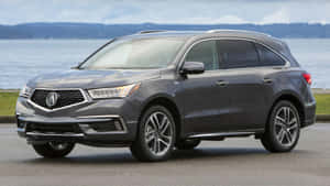 Sleek Acura Mdx On Open Road Wallpaper