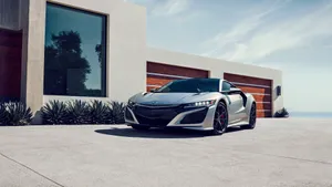 Sleek Acura Nsx In Motion Wallpaper