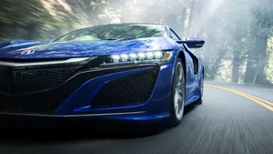 Sleek Acura Nsx Sports Car In Action Wallpaper