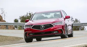 Sleek Acura Rlx In Beautiful Sunset Wallpaper