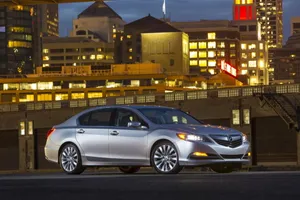 Sleek Acura Rlx Luxury Sedan At Night Wallpaper