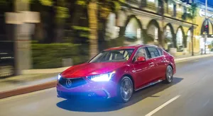 Sleek Acura Rlx On Open Road Wallpaper