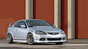 Sleek Acura Rsx Type-s In Action Wallpaper