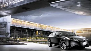 Sleek Acura Tl In A Stunning Urban Landscape Wallpaper