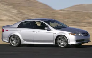 Sleek Acura Tl On The Road Wallpaper