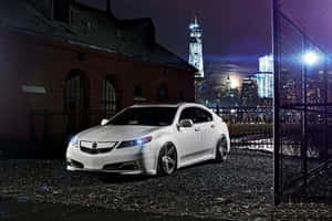 Sleek Acura Tsx Cruising On The Open Road Wallpaper