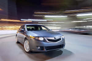 Sleek Acura Tsx Sedan Showcasing Its Design And Elegance Wallpaper