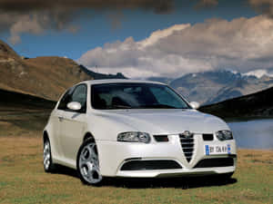 Sleek Alfa Romeo 147 In Action Wallpaper