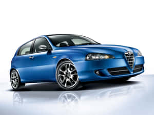 Sleek Alfa Romeo 147 In Urban Setting Wallpaper