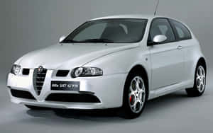 Sleek Alfa Romeo 147 Showcasing Its Italian Artistry Wallpaper