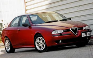 Sleek Alfa Romeo 156 In Action Wallpaper