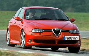 Sleek Alfa Romeo 156 In Motion Wallpaper