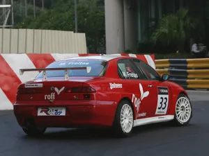 Sleek Alfa Romeo 156 In Motion Wallpaper