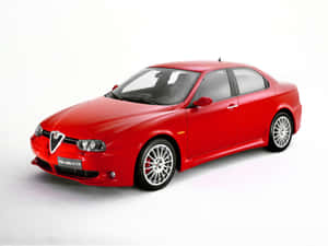 Sleek Alfa Romeo 156 On A Picturesque Road Wallpaper