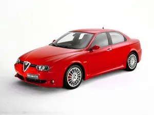 Sleek Alfa Romeo 156 On A Picturesque Road Wallpaper