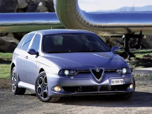 Sleek Alfa Romeo 156 On A Scenic Drive Wallpaper