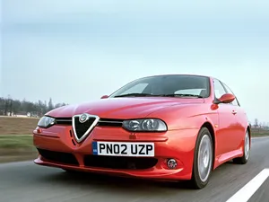 Sleek Alfa Romeo 156 On The Road Wallpaper