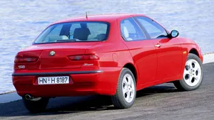 Sleek Alfa Romeo 156 On The Road Wallpaper