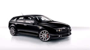 Sleek Alfa Romeo 159 On A Highway Wallpaper