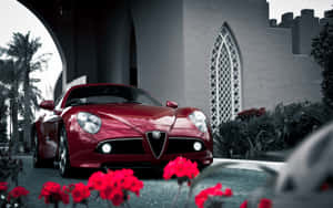 Sleek Alfa Romeo 8c Competizione In Action Wallpaper