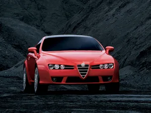 Sleek Alfa Romeo Brera In Action Wallpaper