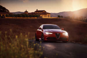 Sleek Alfa Romeo Giulia In Action Wallpaper