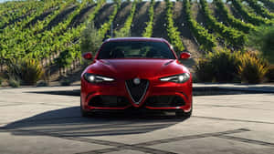 Sleek Alfa Romeo Giulia In Action Wallpaper