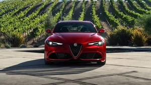 Sleek Alfa Romeo Giulia In Action Wallpaper