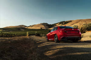 Sleek Alfa Romeo Giulia In Action Wallpaper