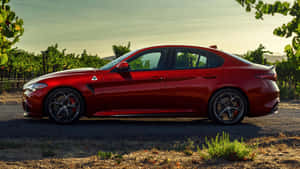 Sleek Alfa Romeo Giulia Showcasing Its Elegant Design And Dynamic Curves Wallpaper