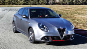 Sleek Alfa Romeo Giulietta In Profile Wallpaper