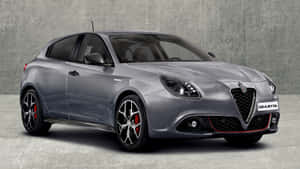 Sleek Alfa Romeo Giulietta On Scenic Road Wallpaper