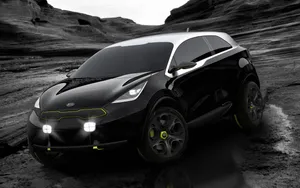 Sleek And Captivating Kia Niro On A Scenic Drive Wallpaper