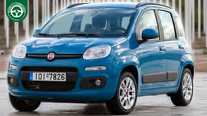 Sleek And Compact Fiat Panda On The Road Wallpaper