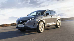 Sleek And Dynamic Nissan Rogue In Natural Environment Wallpaper