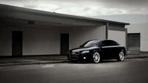 Sleek And Elegant Audi A4 In Urban Environment Wallpaper