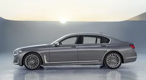Sleek And Elegant Bmw 7 Series In Motion Wallpaper
