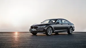 Sleek And Elegant Bmw 7 Series In Urban Setting Wallpaper