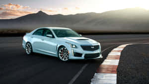 Sleek And Elegant Cadillac Cts On Open Road Wallpaper