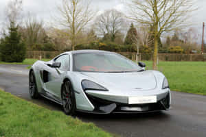 Sleek And Elegant Mclaren 570gt- A Performance Symbol Wallpaper