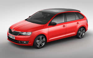 Sleek And Elegant Skoda Rapid On A Beautiful Journey Wallpaper